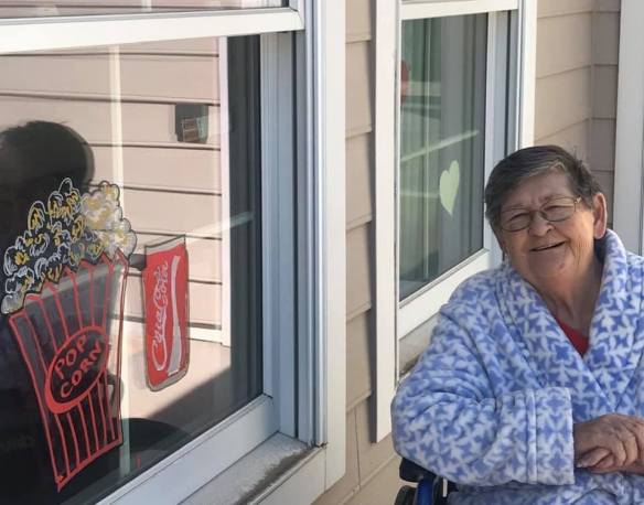 Resident at her window art